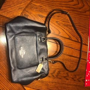 A navy blue coach purse!